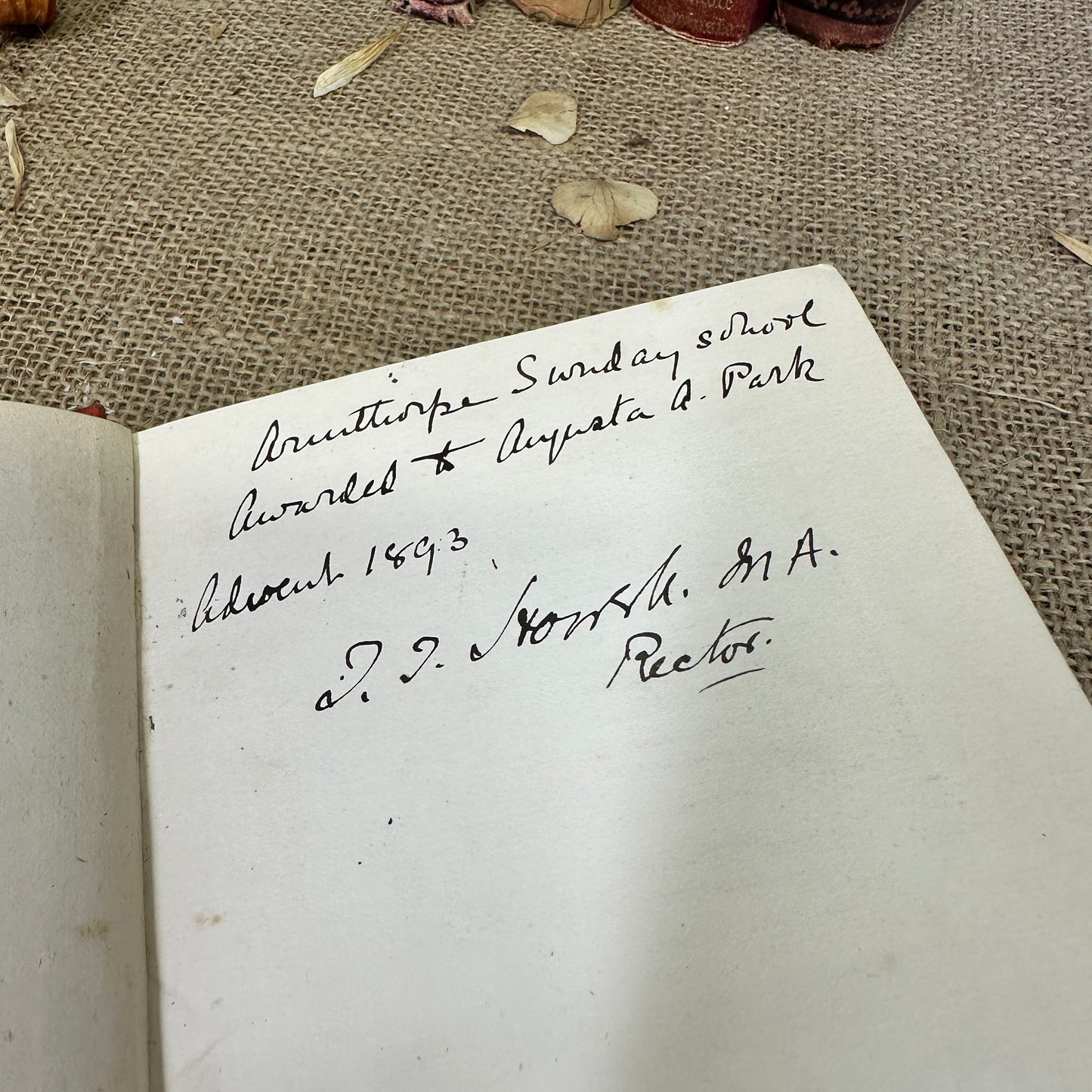 Stack of Red Orange Coloured Books