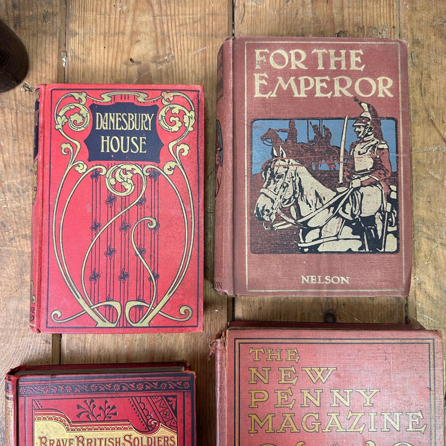 Stack of Vintage Red Coloured Books - The Blind Mole