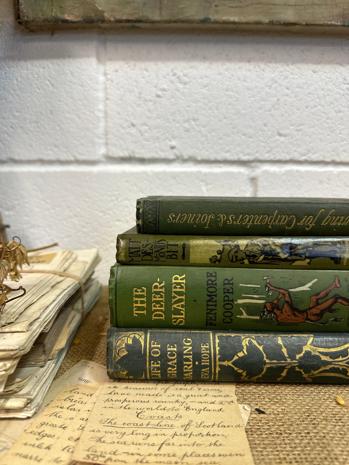 Stack of Green Coloured Books