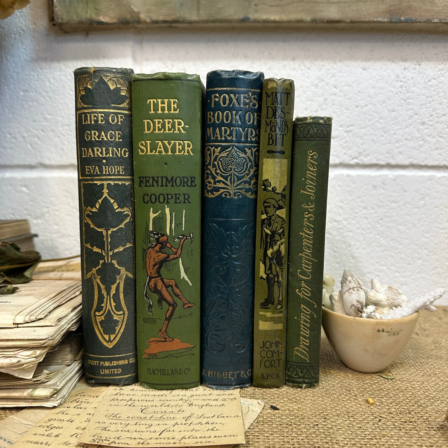 Stack of Green Coloured Books