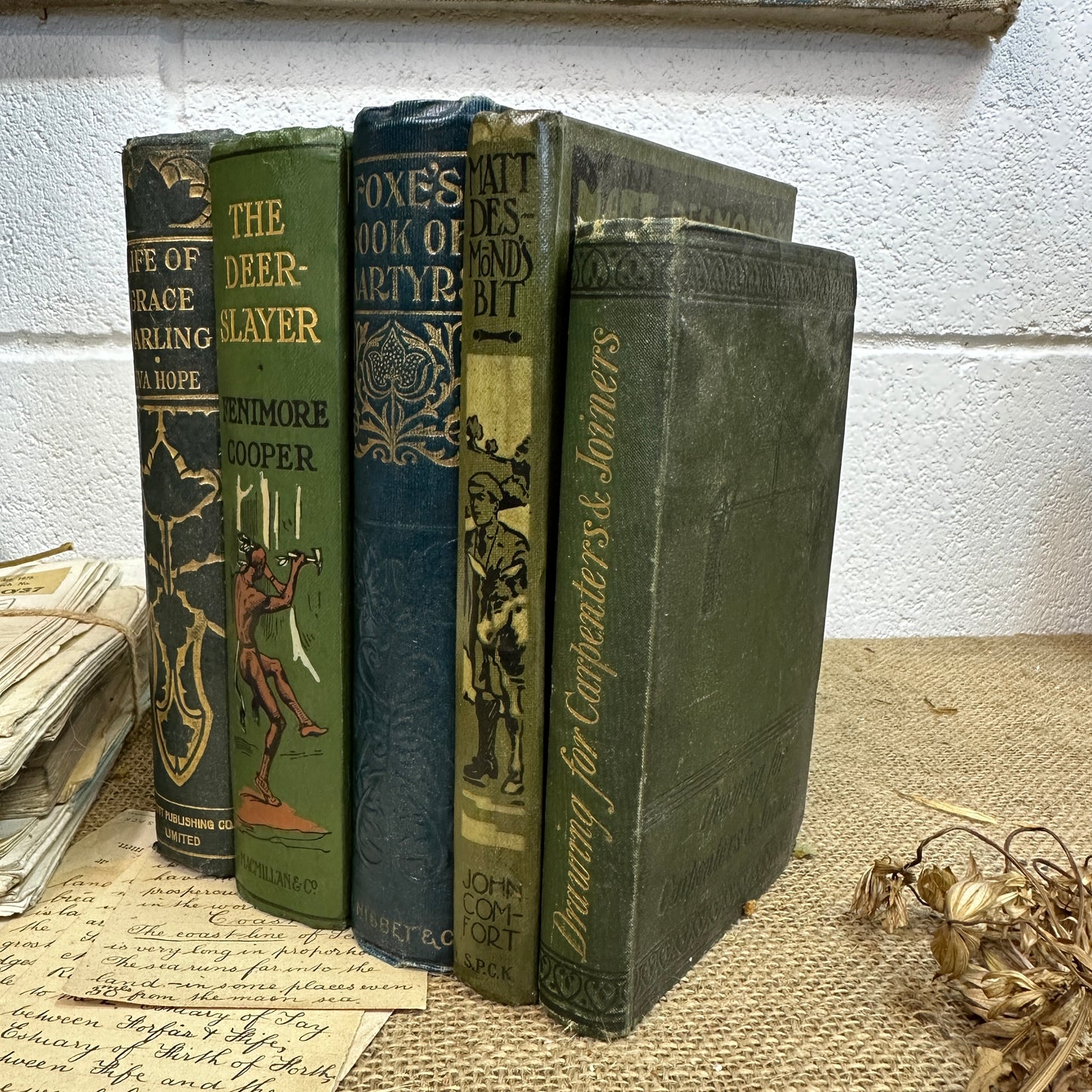 Stack of Green Coloured Books