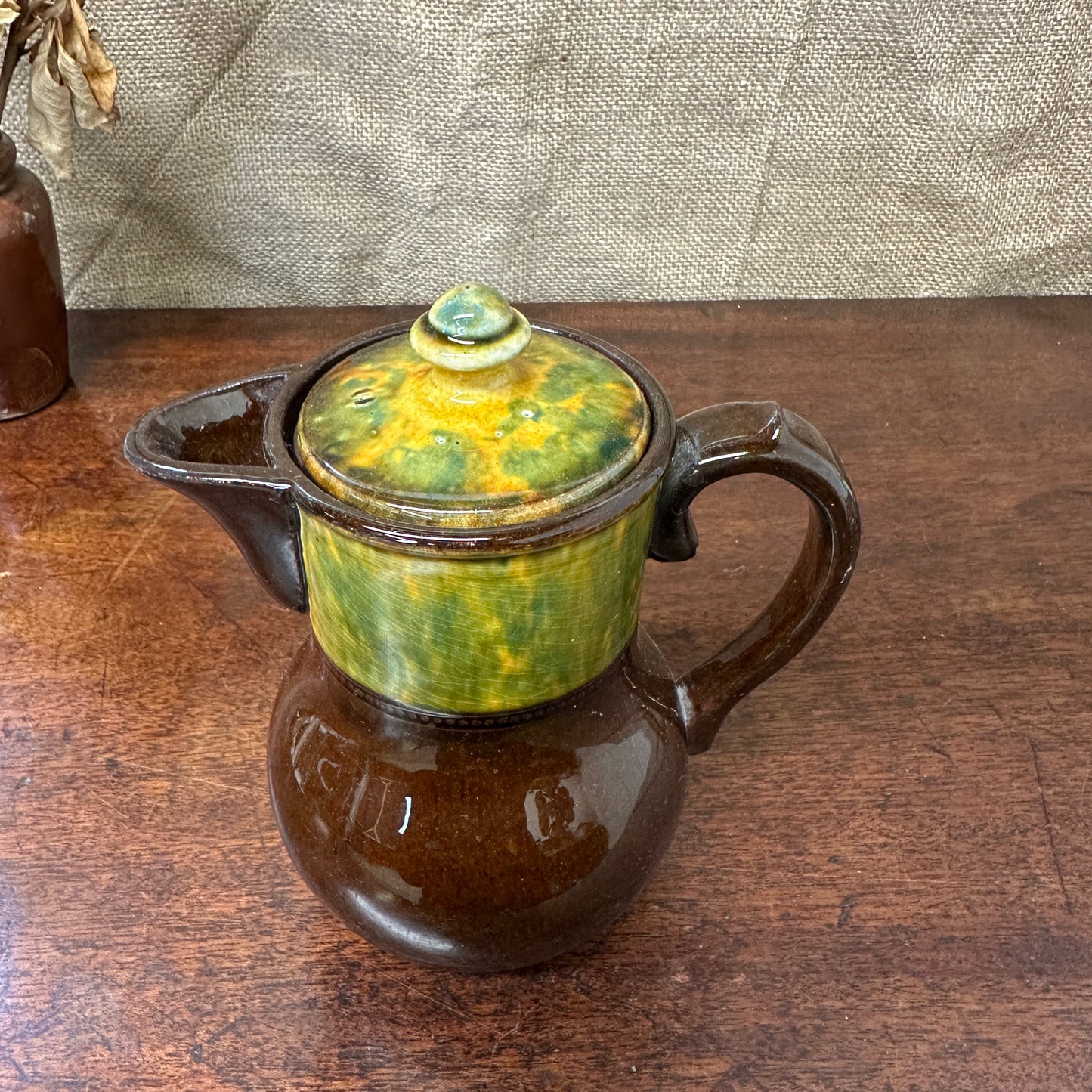 Dip Glazed Brown Stoneware Lidded Jug