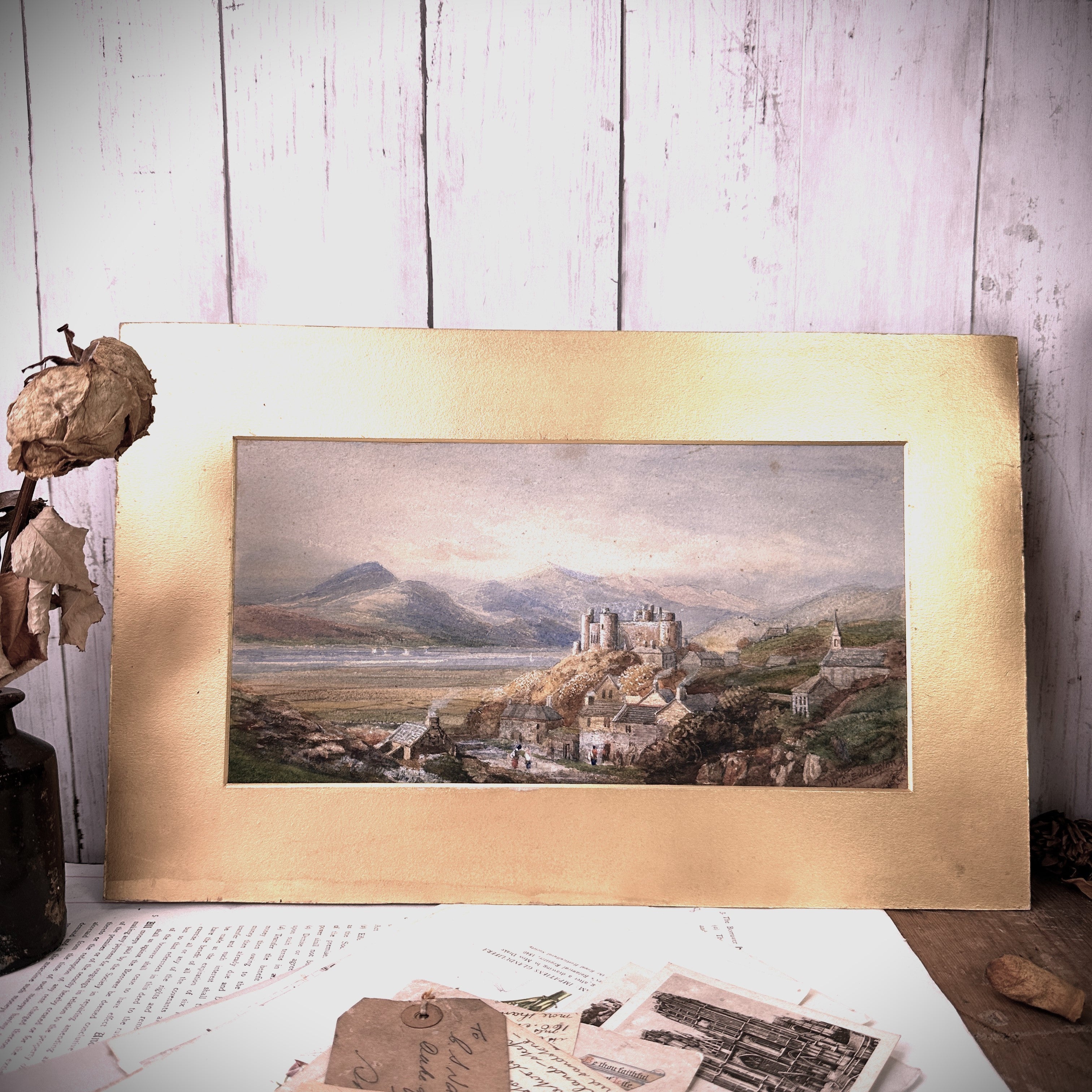 vintage painting of a castle in a gold mount 