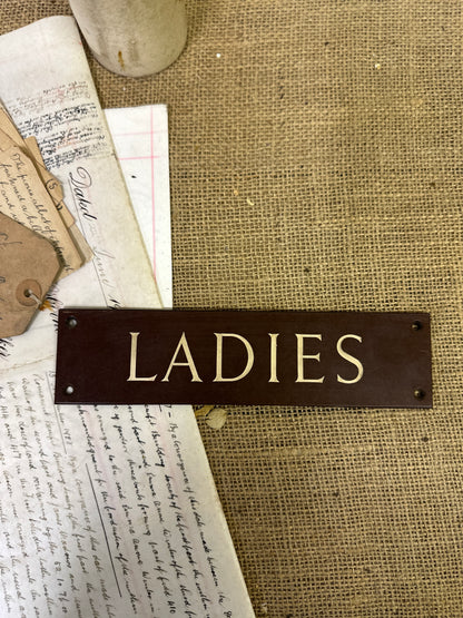 Antique Bakelite Ladies Sign