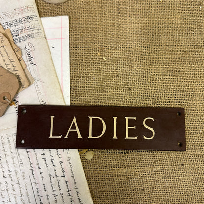 Antique Bakelite Ladies Sign