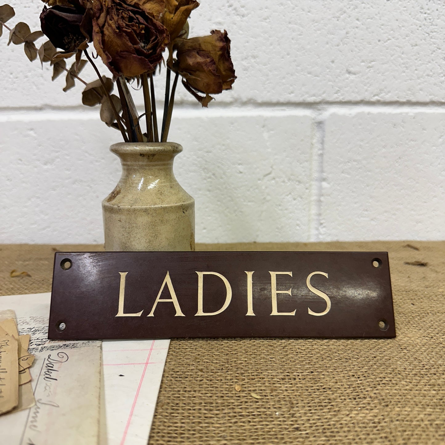 Antique Bakelite Ladies Sign