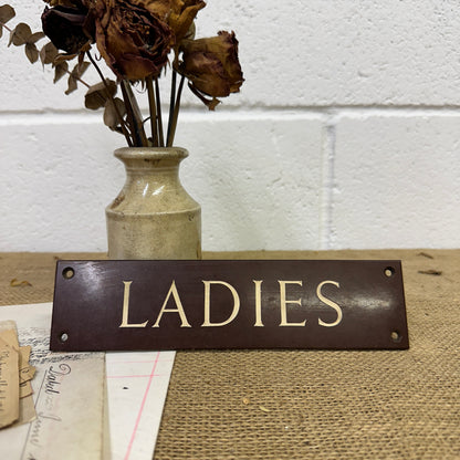 Antique Bakelite Ladies Sign