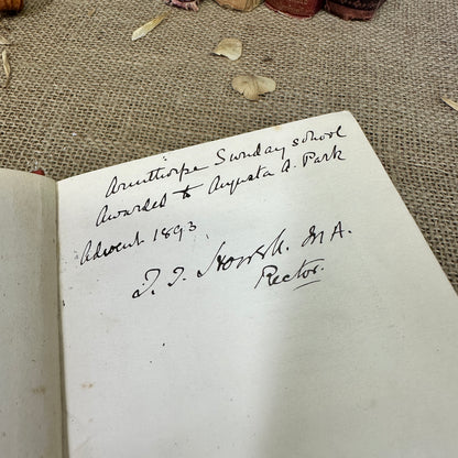 Stack of Red Orange Coloured Books