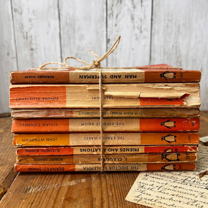 Stack of Vintage Orange Penguin books