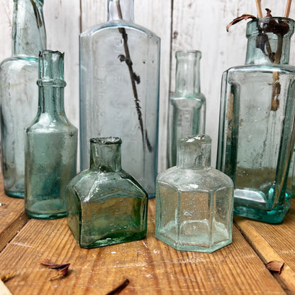 Collection of Eight Antique Glass Poison Apothecary Chemist Bottles Vases