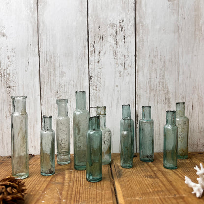 Collection of Eleven Antique Glass Poison Apothecary Chemist Bottles Vases