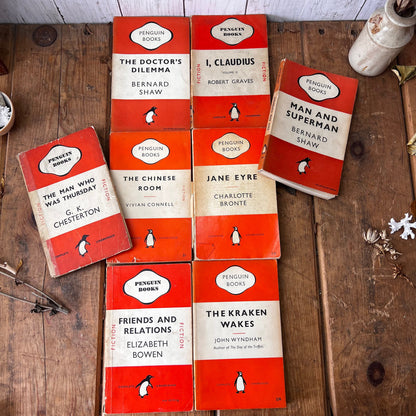 Stack of Vintage Orange Penguin books