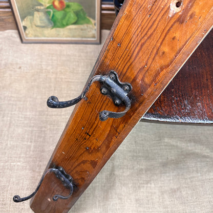 Antique Set of Three Black Hooks on Piece of Oak