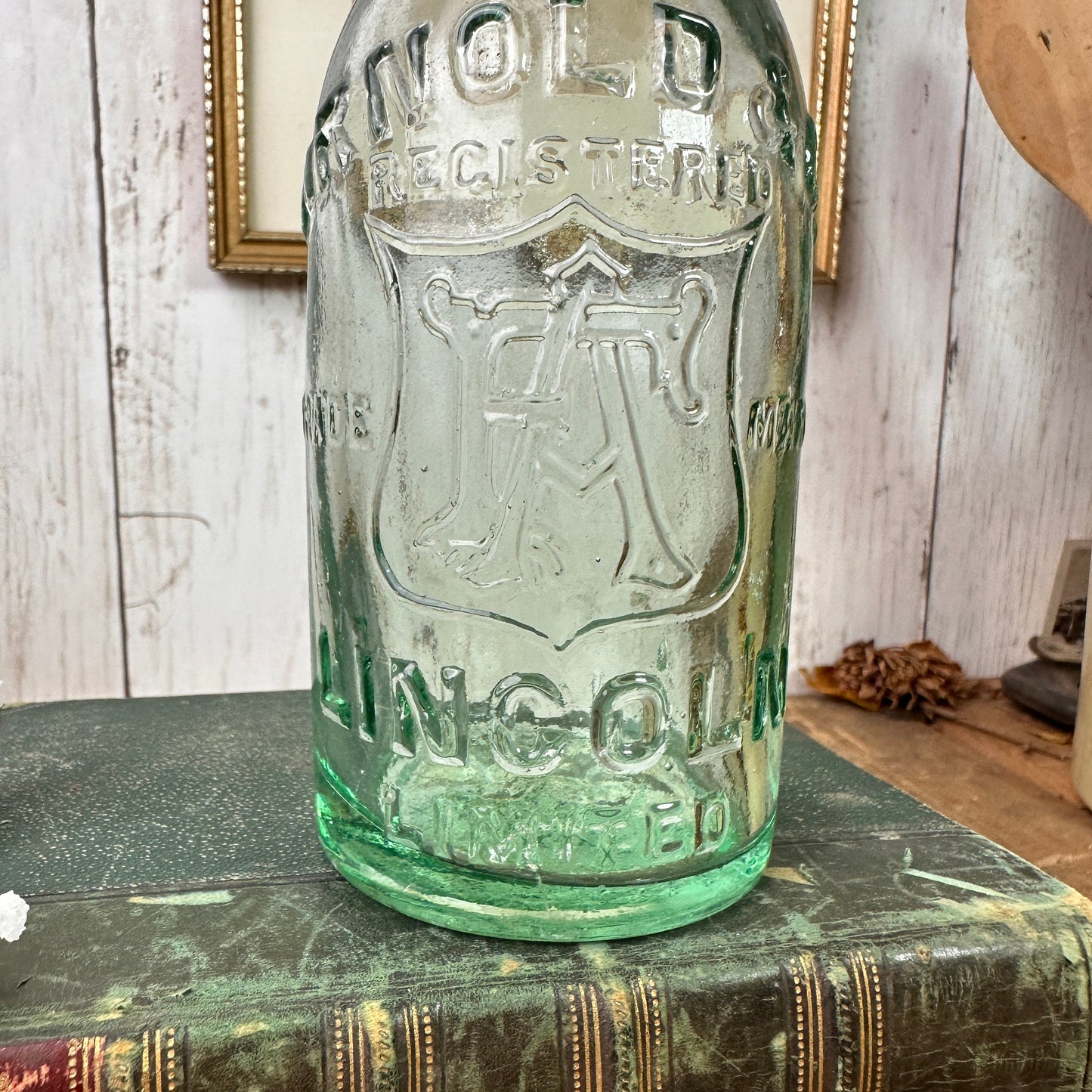 Antique Arnold & Co Lincoln Glass Bottle with Original Lid