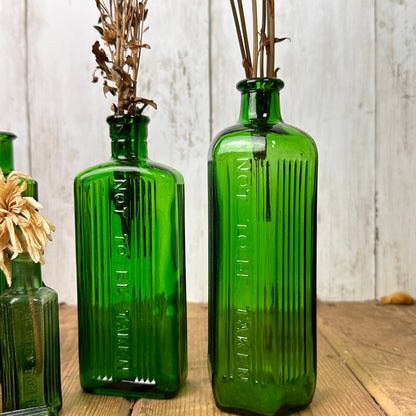 Seven Green Poison Apothecary Chemist Bottles