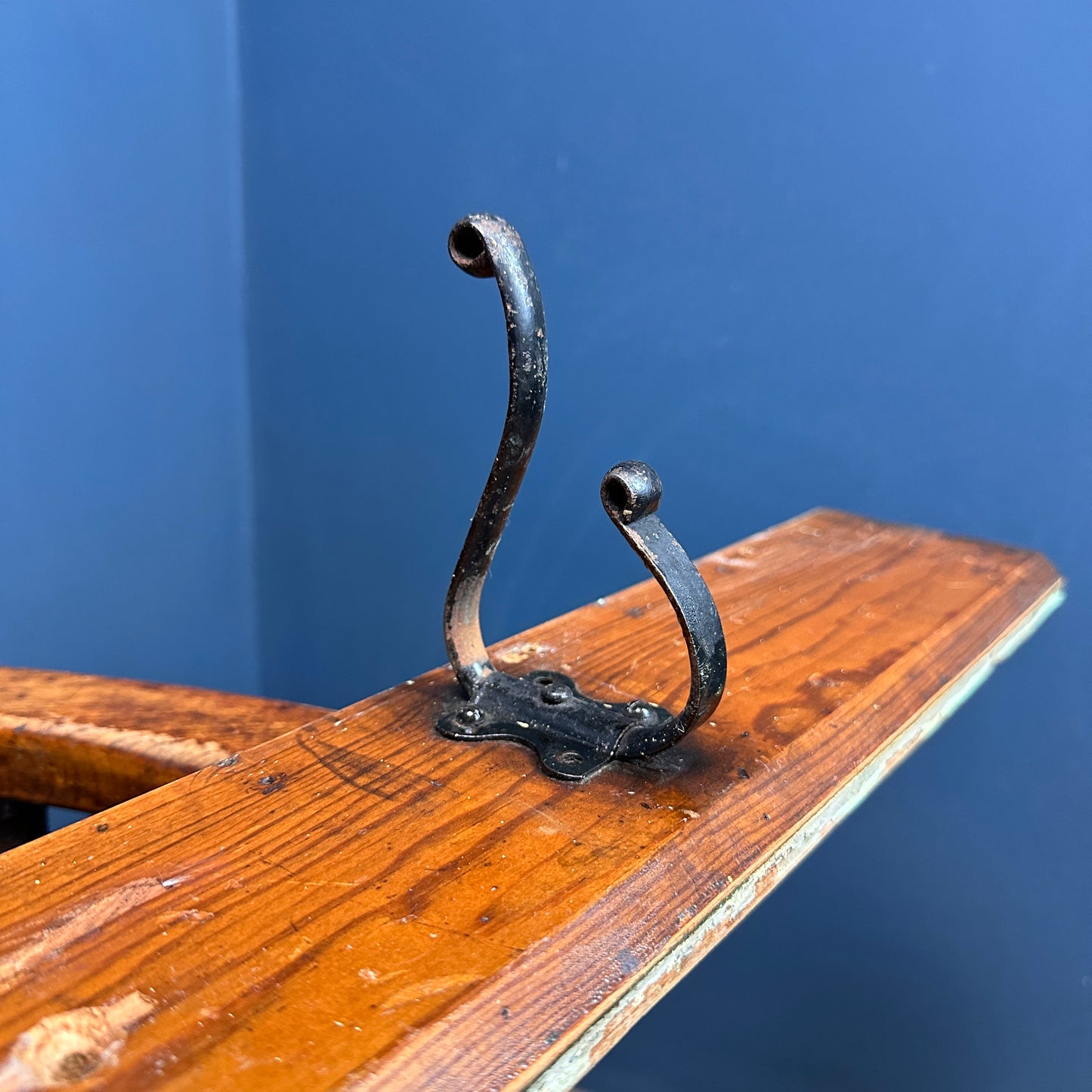 Antique Set of Three Black Hooks on Piece of Oak