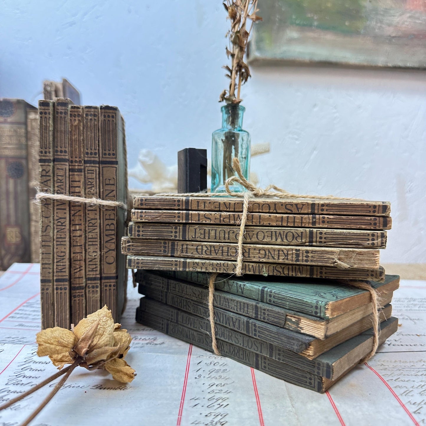 Stacks of Antique Green Paper Backed Books The Works of William Shakespeare JM Dent