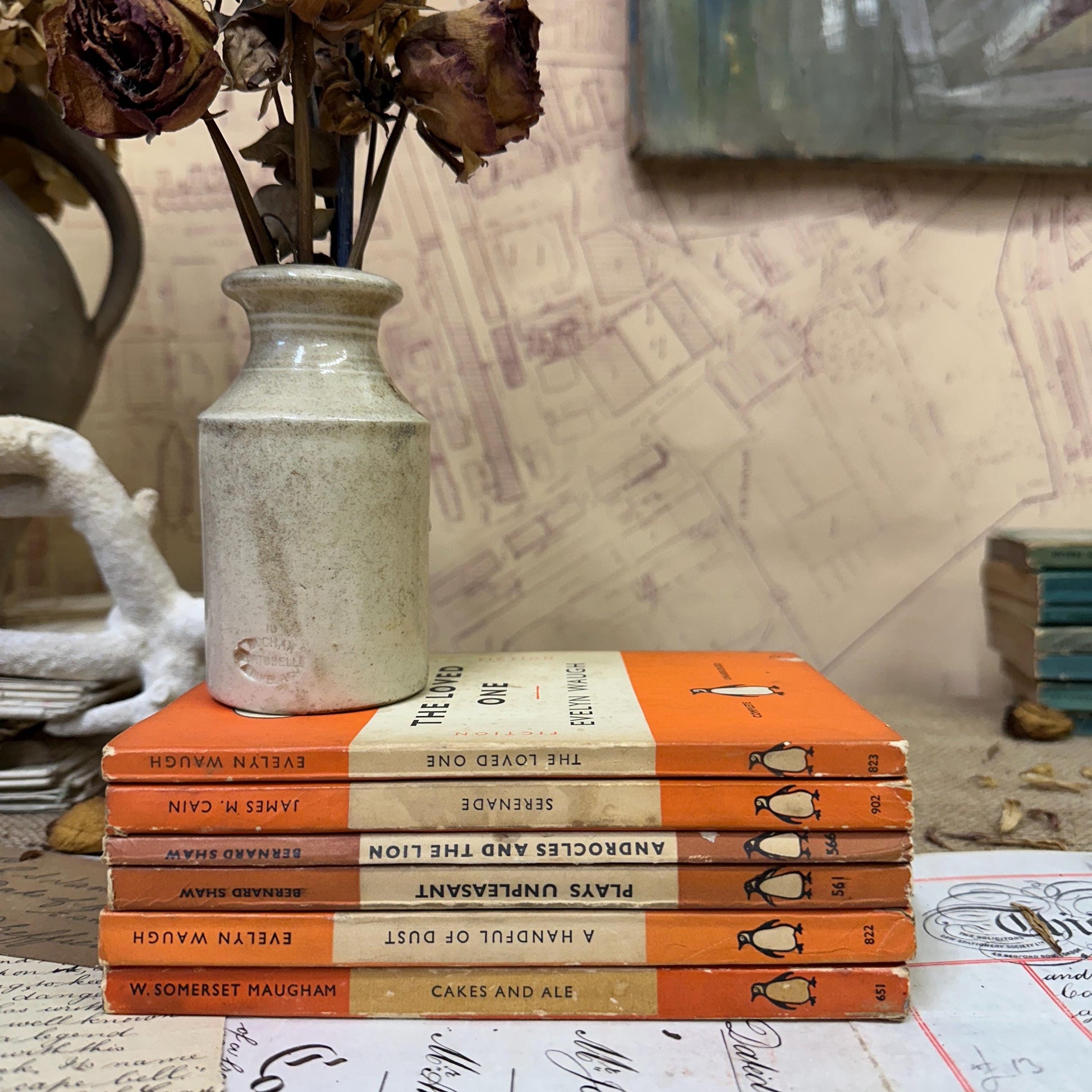 Stack of Vintage Orange Penguin books